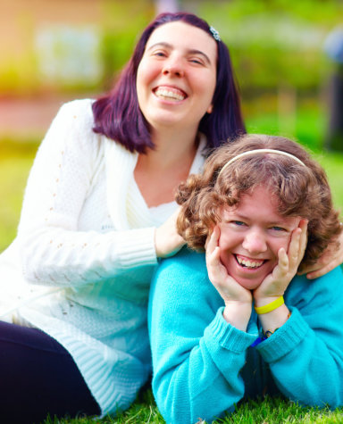 two female special child smiling