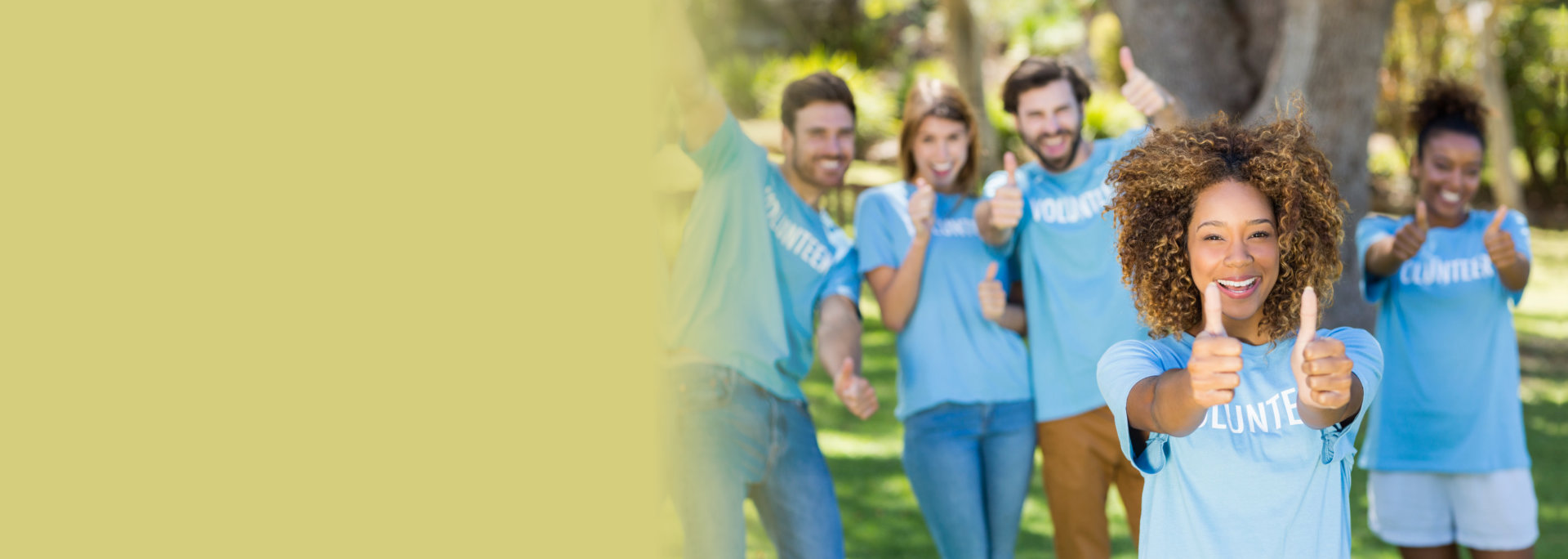 a group of people showing thumbs up